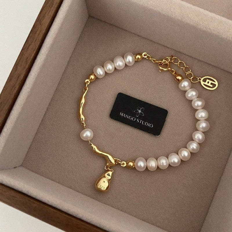 Fashionable Adjustable Pearl-Style Waterdrop Bracelet 913c05b574f3c8271aea1bd0c40b2b78